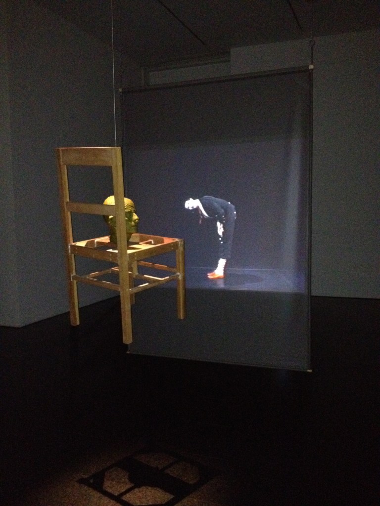 Bruce Nauman, "Shit on Your Hat - Head on a Chair", 1990